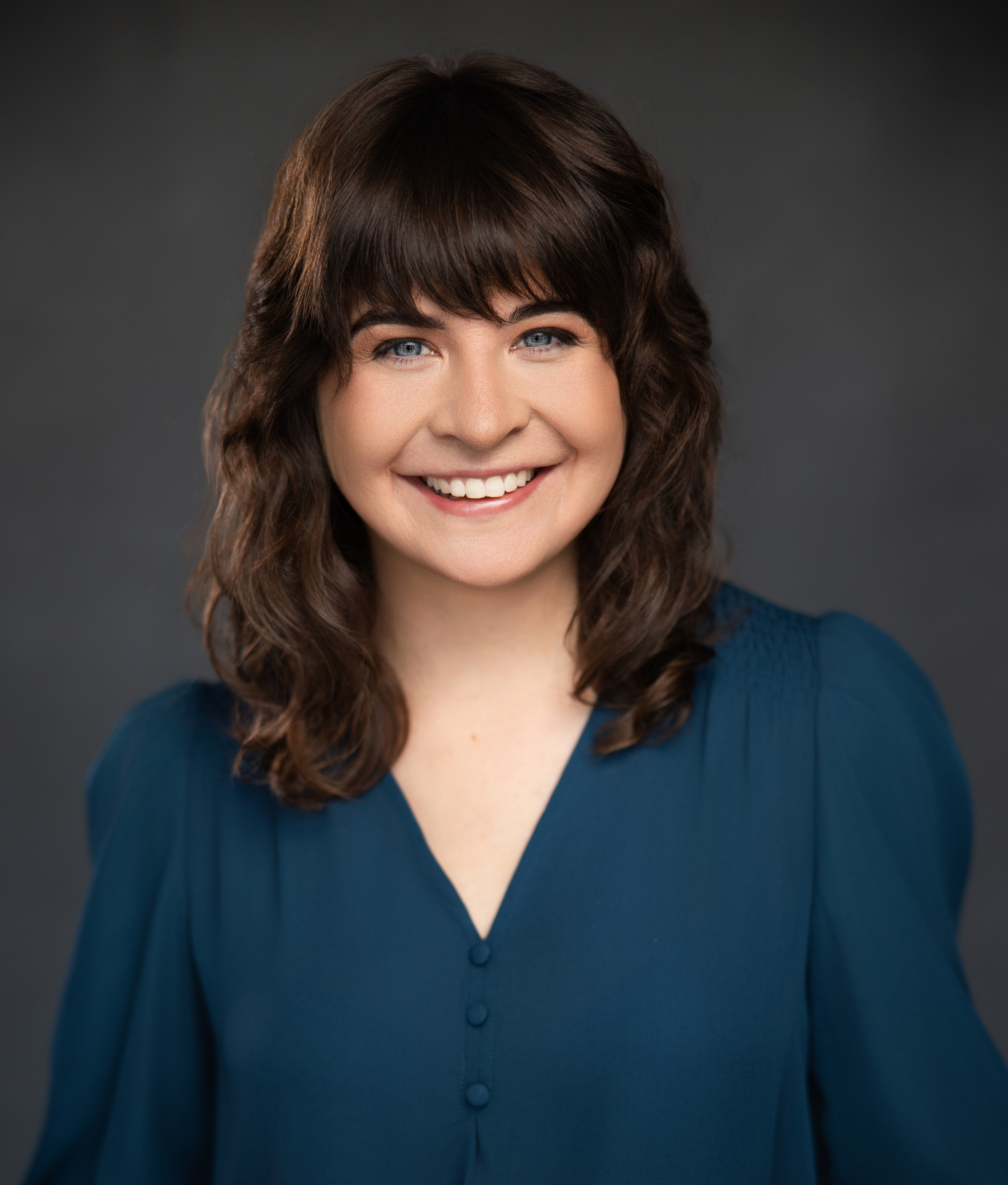 Professional-Photo2024Smiling-croppedcopy.jpg